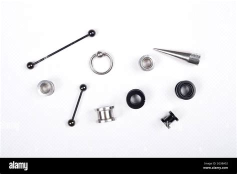 Set Of Piercing Accessories On White Background Stock Photo Alamy