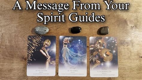 Three Tarot Cards With The Words A Message From Your Spirit Guides