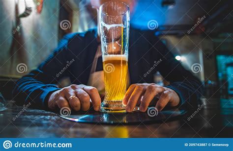 Man Holds A Glass Of Beer In His Hand Stock Image Image Of