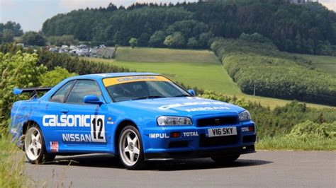 Driving a Calsonic Nissan Skyline GT-R R34 on a Nürburgring road trip ...