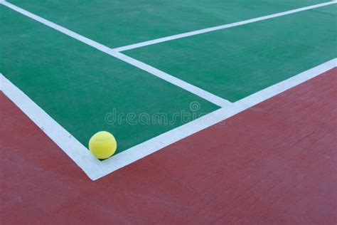 Tennis Ball Just Inside Of The Corner Of Hard Court Stock Image Image