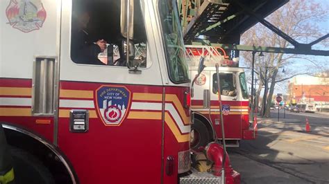 Fdny Engine And Ladder Responds To A Moto Car Accident At