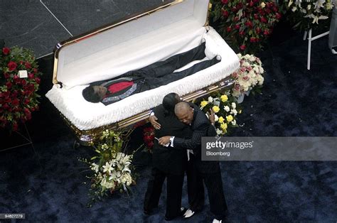 Mourners Console Each Other At The Casket Of Singer James Brown At