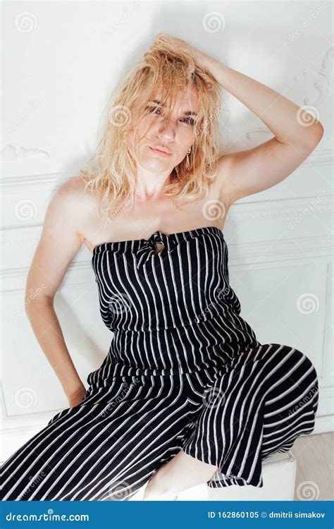 Beautiful Fashionable Blonde Woman In Striped Jumpsuit Stock Image Image Of Blond Lady 162860105