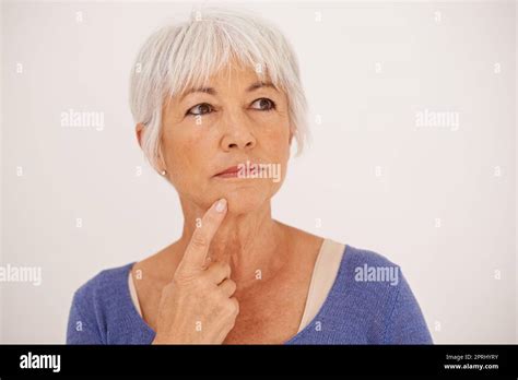 Wonder What I Should Do For Dinner Cropped Image Of A Mature Woman