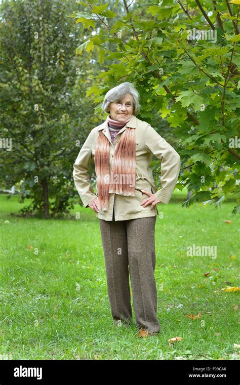 Senior Woman Walking Stock Photo Alamy