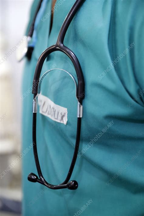 Doctor with stethoscope - Stock Image - C057/1210 - Science Photo Library