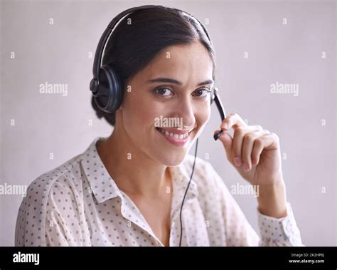 Ready To Take Your Call An Attractive Young Call Centre Operator Stock