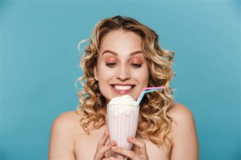 Premium Photo Adorable Half Naked Woman With Curly Hair Smiling While Holding Milk Shake