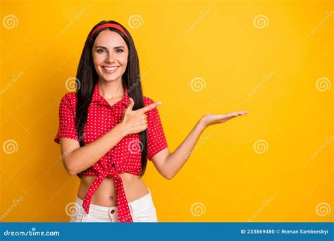 Photo Of Adorable Sweet Young Girl Dressed Red Shirt Holding Pointing