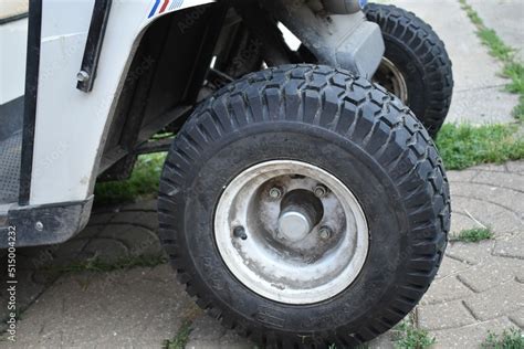 Tire on a Golf Cart Stock Photo | Adobe Stock