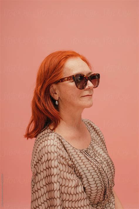 Redhead Mature Model In Sunglasses By Stocksy Contributor Liliya Rodnikova Stocksy