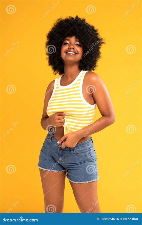 Charismatic Cute African American Female Model In Trendy Jeans Shorts