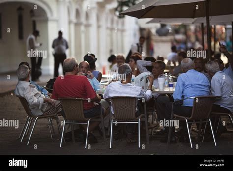 Dominican Republic Santo Domingo Zona Colonial Calle El Conde Outdoor Cafe Dusk Nr Stock