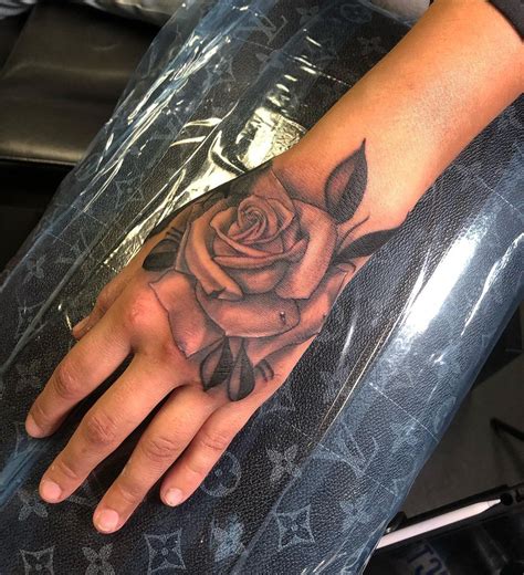 Update More Than 84 Rose Hand Tattoo Men Best In Cdgdbentre