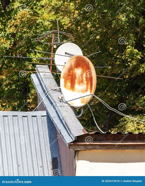 Old Rusty Satellite Dish On The Roof Of A House Stock Photo Image Of