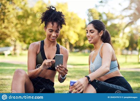 Lets Take A Selfie Two Attractive Young Women Sitting Next To Each