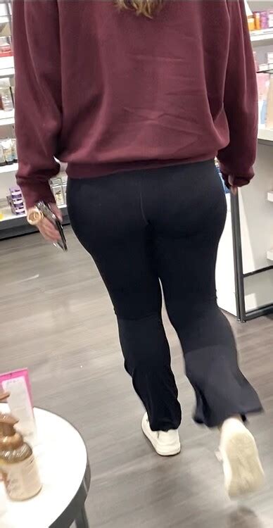 Wide Ass And Hips In Black Flares Bends Over Spandex Leggings