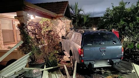 Rosewater Crash Car Slams Through Fence The Courier Mail