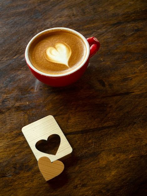 Premium Photo Cup Of Love Heart Latte Art Coffee