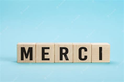 Premium Photo Merci Thank You In French Language Merci Word On Letter