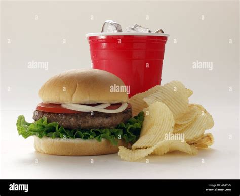 A Hamburger With Potato Chips And Soda Stock Photo 541533 Alamy