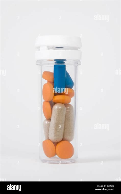 Blue Orange And Brown Pills In A Bottle Stock Photo Alamy