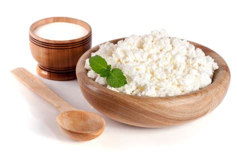 Cottage Cheese In A Wooden Bowl Isolated On A White Background Stock