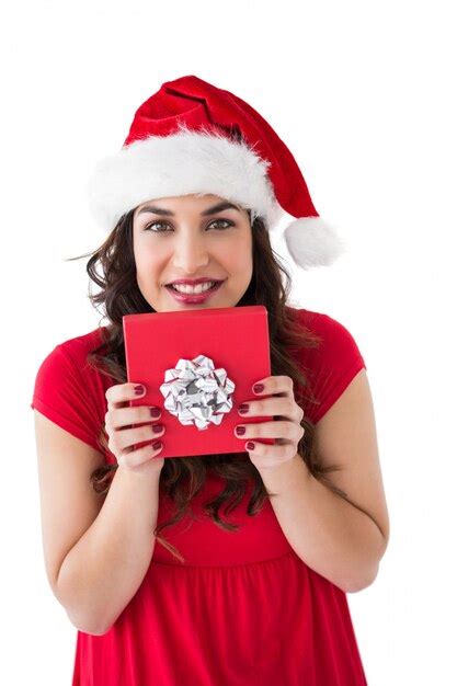 Premium Photo Festive Brunette Holding Gift With Bow