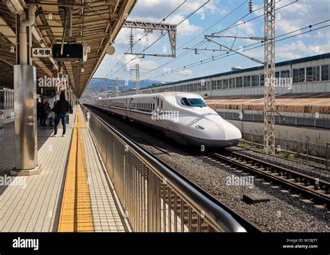 Shinkansen High Speed Train Travels Through Mishima Station Shizuoka