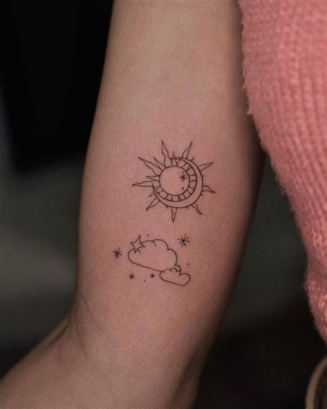 Fine Line Cloud Sun And Moon Tattoo Located On The