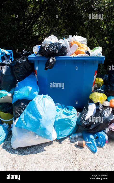 Overflowing Waste Collection Bin Outdoors Stock Photo Alamy