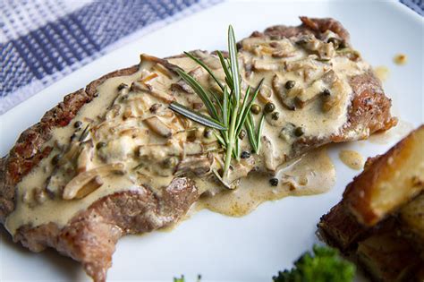 Steak With A Peppercorn Mushroom And Brandy Sauce Love The Kitchen