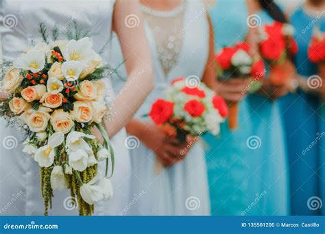 Mexican Wedding Bouquet Of Flowers In The Hands Of The Bride In Mexico