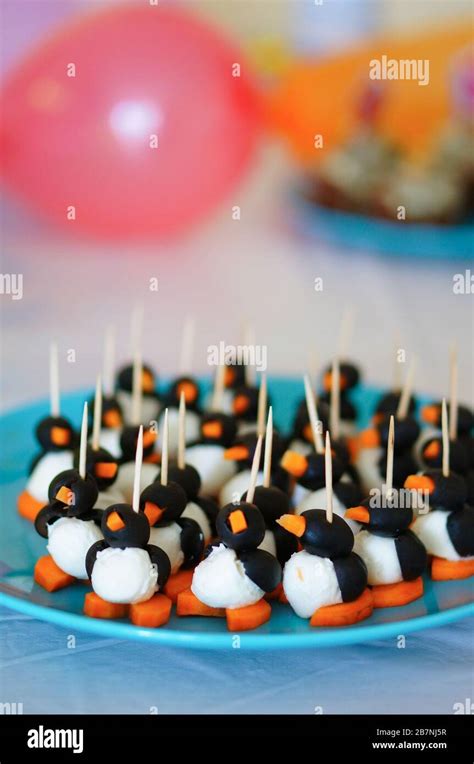 Lot Of Penguin Snacks Made With Mozzarella Cheese And Carrots For A