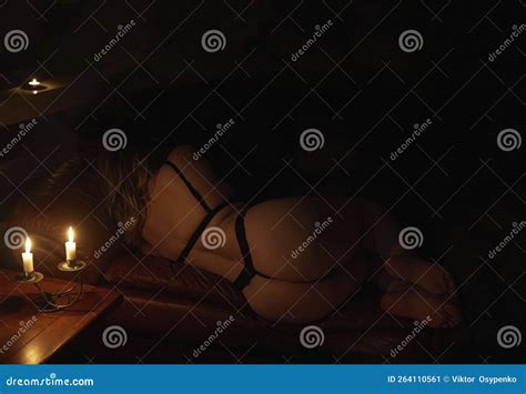 Beautiful Naked Woman In A Dark Room In The Light Of Candles Stock Image Image Of Gorgeous