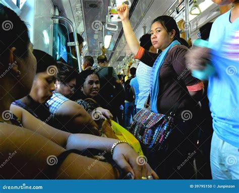 Passengers Or Commuters Inside A Train In Manila Philippines In Asia