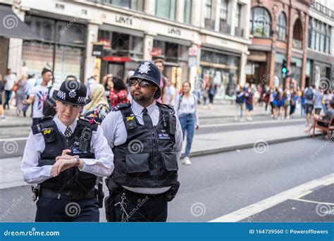 London Uk July 2019 Two British Police Officers Patrolling The