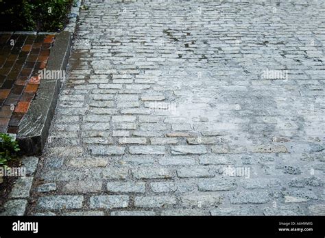 Paving Stones And Puddles Stock Photo Alamy