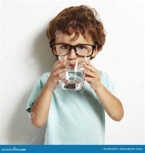 Boy Drinking a Glass of Water Stock Photo - Image of white, color: 26924764