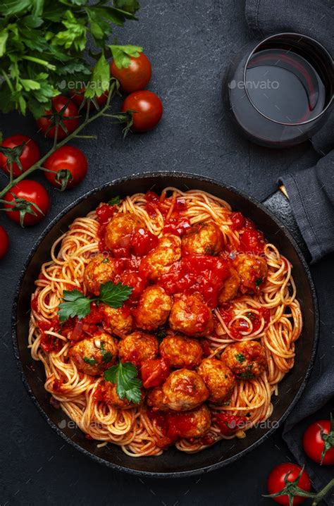 Italian Spaghetti In Bolognese Sauce With Meatballs Black Table