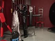 Blonde Girl In Black Latex Catsuit Full Encased In Inflatable Rubber And Full Body Plastic Suit