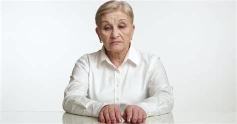 Thoughtful Upset Elegant Pretty Elderly Woman Nervously Tapping Fingers