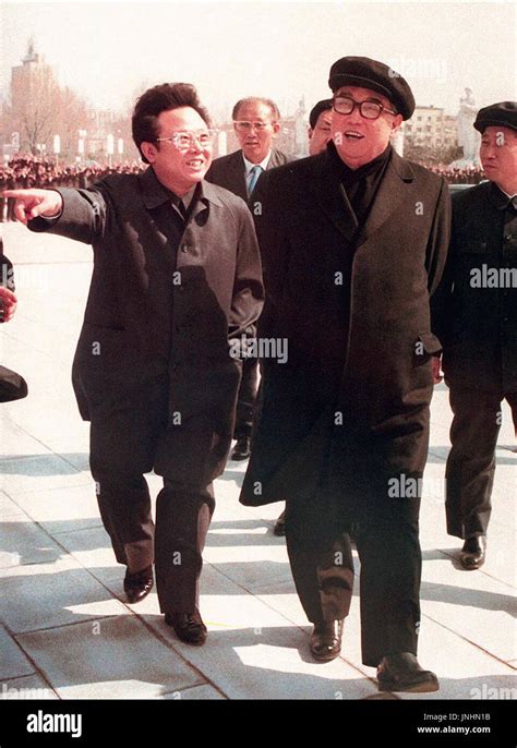 TOKYO, Japan - North Korean leaders Kim Jong Il (L) and his father, Kim ...