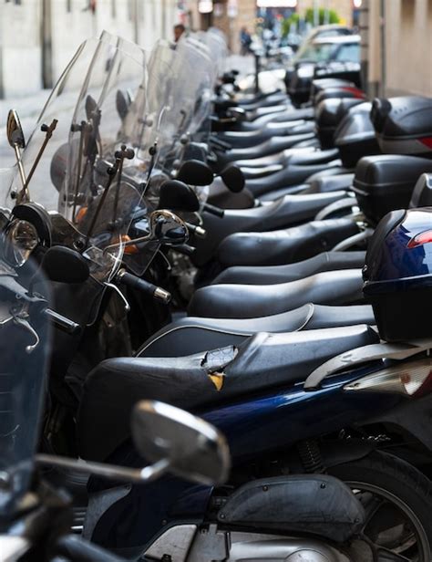 Premium Photo Many Parked Scooters On Street In Florence City