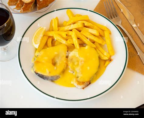 Stewed Hake Merluza En Salsa Holandesa With Potatoes Stock Photo Alamy