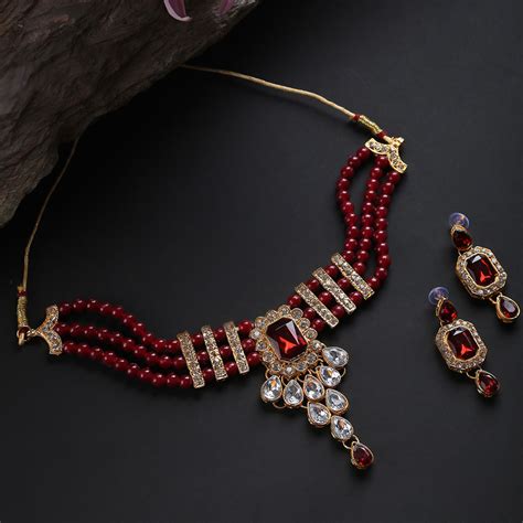 Buy SOHI Gold Plated White Red Stone Studded Pearl Beaded Jewellery