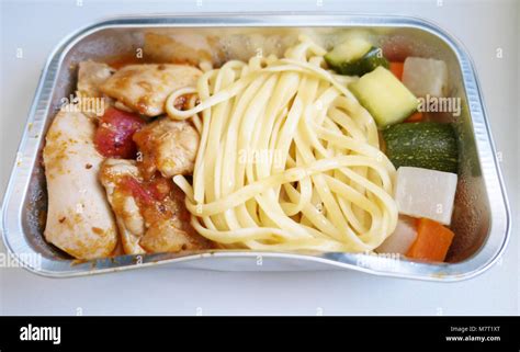 Airplane Food Pasta With Chicken And Vegetables Stock Photo Alamy