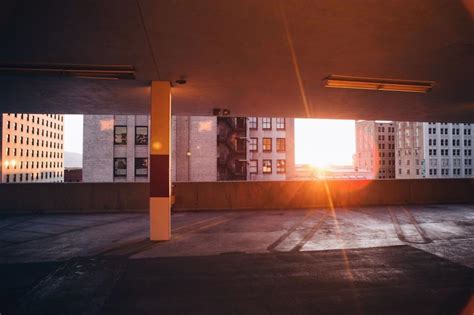 Free Stock Photo Of Sun Shining Through Windows Of Parking Garage