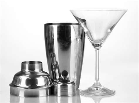 Premium Photo | Cocktail shaker and cocktail glass isolated on white